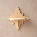 My Kitty City star-shaped solid wood wall-mounted cat climbing step with a natural grain finish on a textured wall.