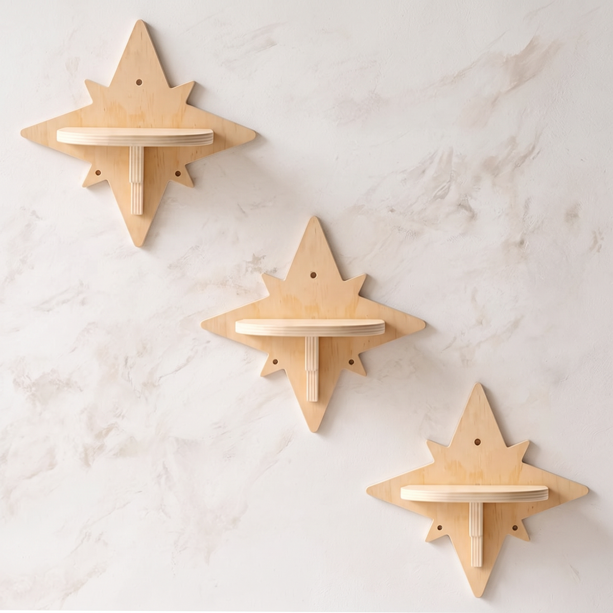 My Kitty City Celestial Star Step wall-mounted wooden cat shelves in a star shape arranged on a textured white wall.